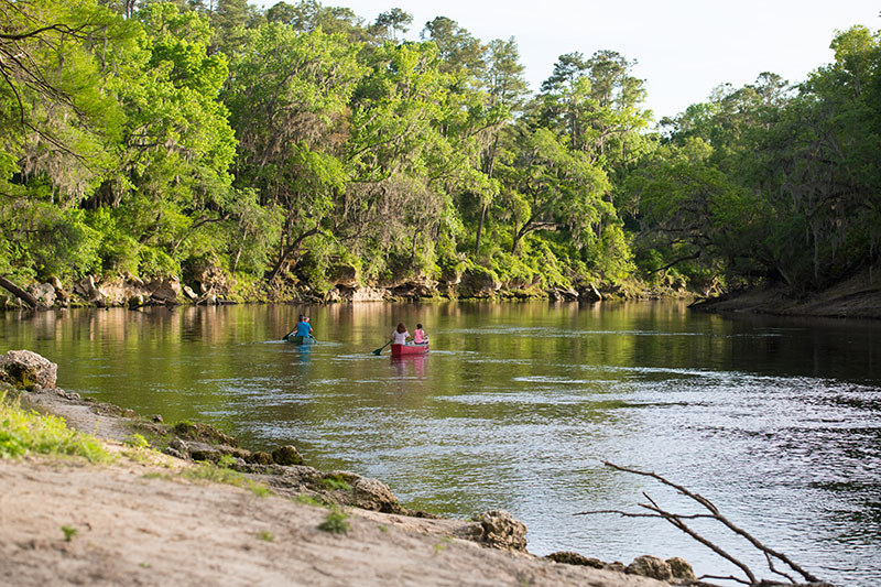 Two kayaks are seen floating along the shoreline in McAlpin in Suwannee County, Florida.